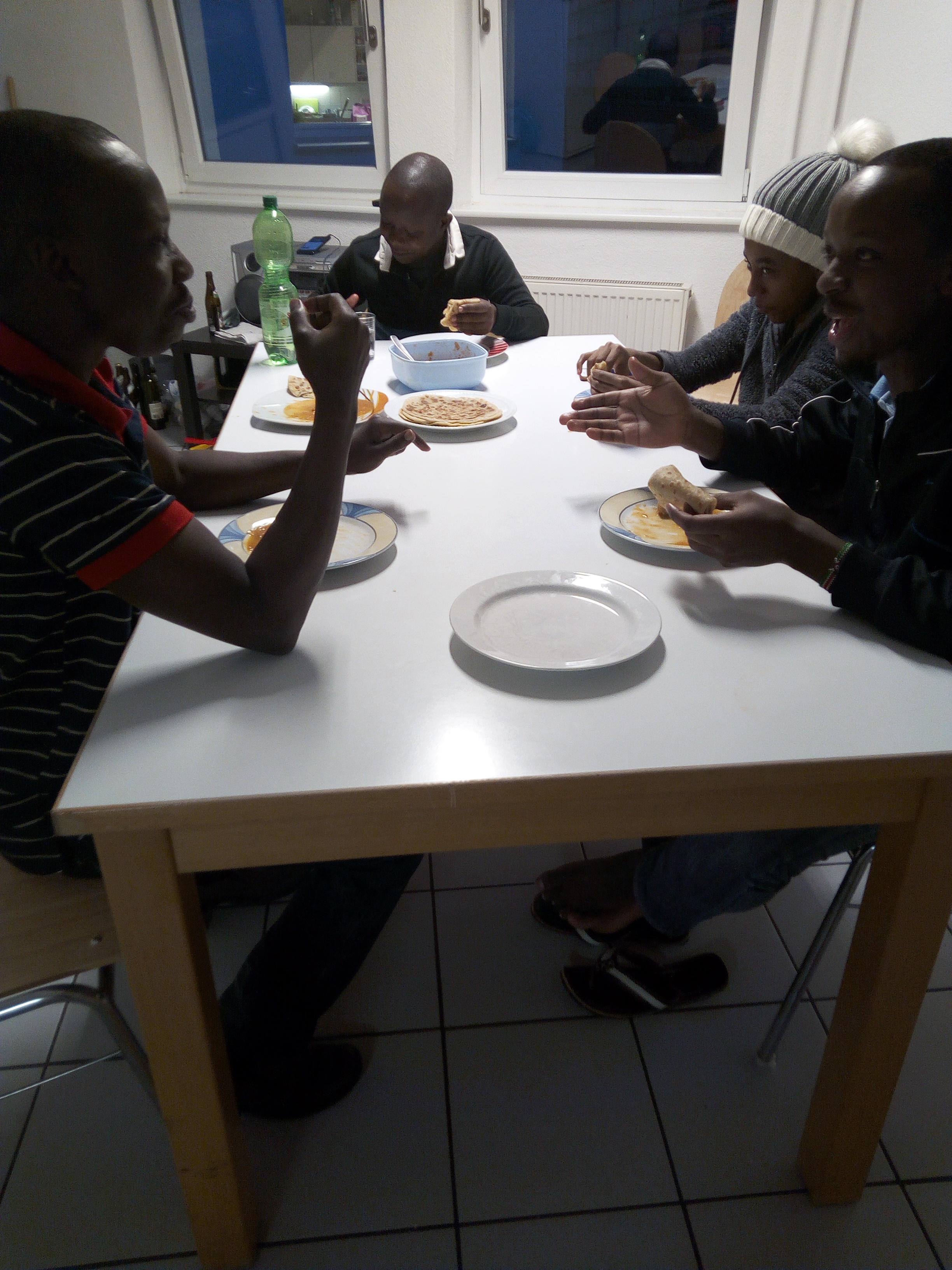 sharing some favourite food with my African friends